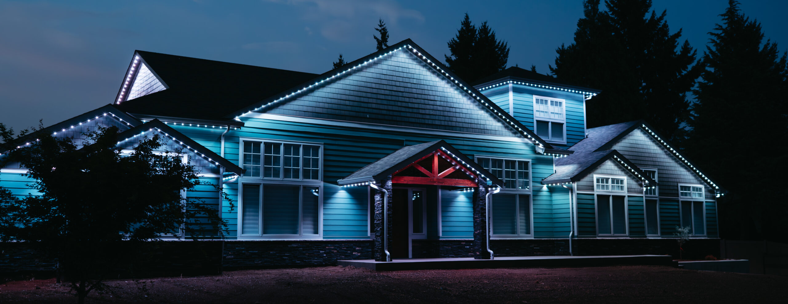 Gemstone Lights roofline installation on an Oregon residential property Gemstone Lights roofline installation on an Oregon residential property