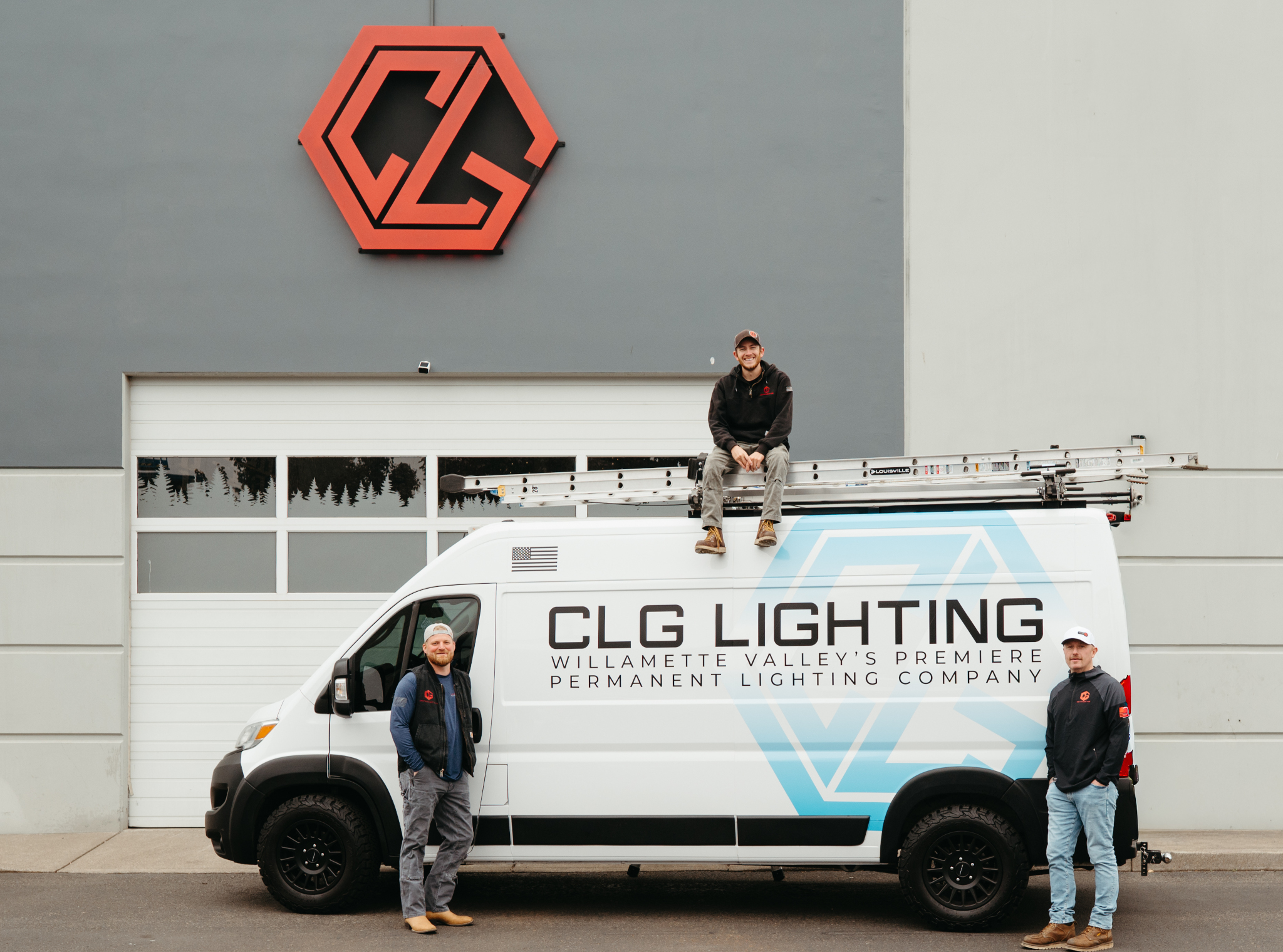 CLG Lighting Oregon team in front of company van and shop CLG Lighting Oregon team in front of company van and shop