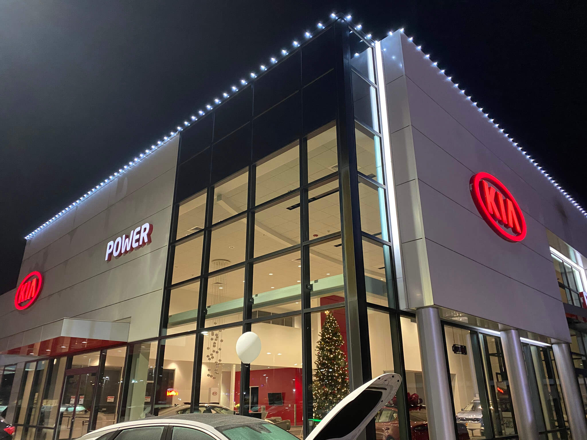Professional Christmas lighting display at Power Kia dealership Oregon